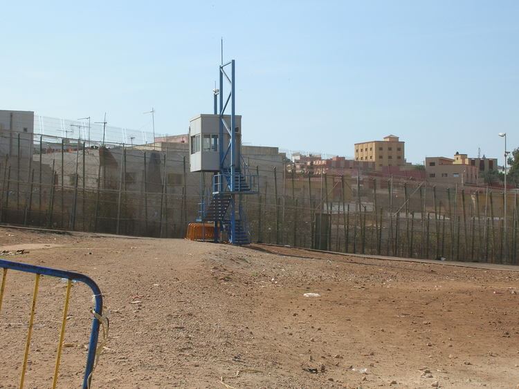 Melilla border fence FileMelilla border fence with guardpostjpg Wikimedia Commons