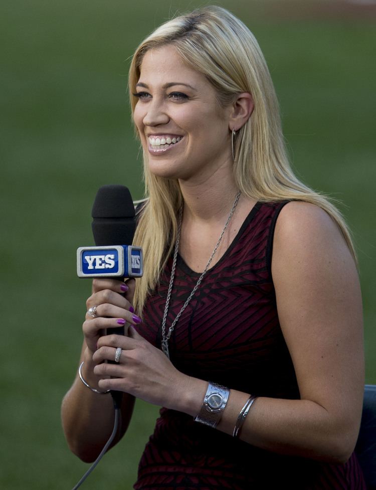 Meredith Marakovits wearing a black sleeveless shirt while reporting on YES network
