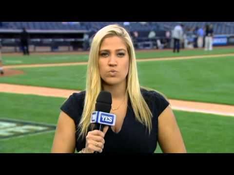 Meredith Marakovits wearing a back shirt while reporting on YES network