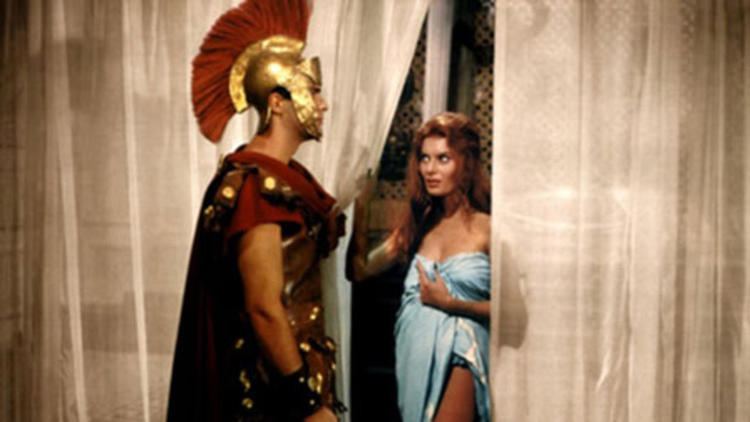 Belinda Lee as Valeria Messalina looking at the soldier in a movie scene from Messalina (1960 film)
