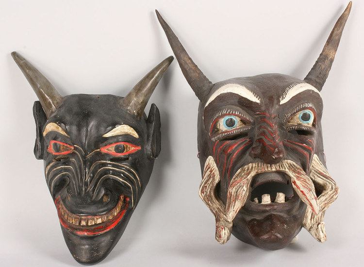 Mexican mask-folk art Lot 509 Pair of Mexican Folk Art Diablo masks Black Devil