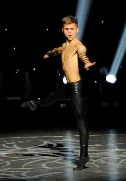 Michael Dameski performs a dance routine to "Unstoppable" on a reality television dance competition, "So You Think You Can Dance"
