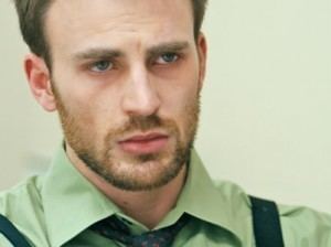 Chris Evans wearing green long sleeves in a movie scene from Puncture (2011 film)