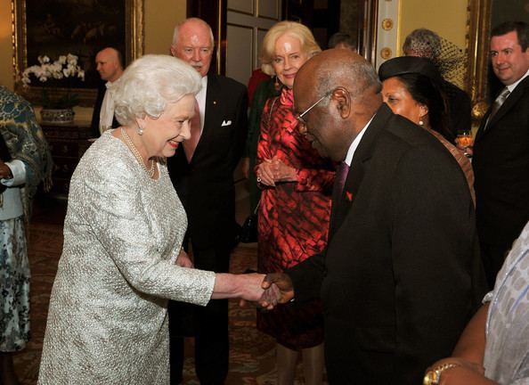 Michael Ogio Queen Elizabeth II and Michael Ogio Photos Zimbio