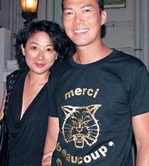 Michael Tse smiling and wearing a black printed t-shirt while Tina Lee Tin Yan wearing a black blouse