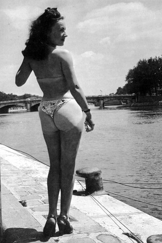 Micheline Bernardini wearing the World’s first bikini at the Molitor Pool in Paris (back view)