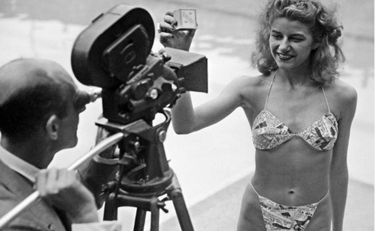 Micheline Bernardini in front of a videographer wearing the World’s first bikini
