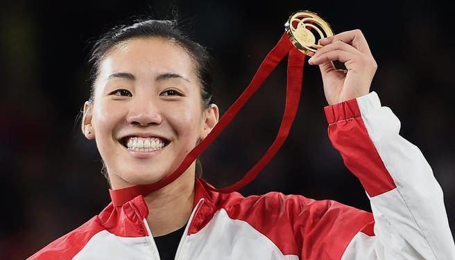 Michelle Li (badminton) Michelle Li wins historic badminton gold for Canada The