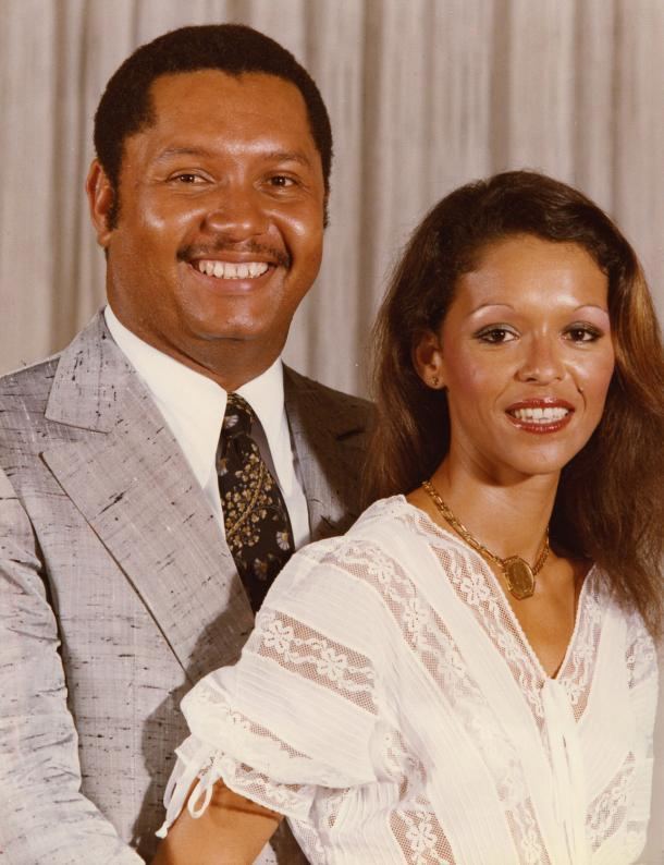 Jean-Claude Duvalier smiling with his wife Michele Bennett who is wearing white dress