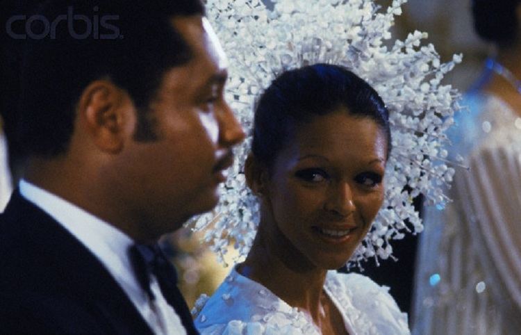 Michele Bennett smiling and looking at her husband Jean-Claude Duvalier during their wedding ceremony