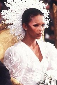 Michèle Bennett wearing wedding gown and headdress