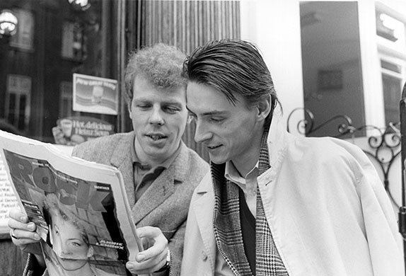 Mick Talbot Weller and Mick Talbot reading Rock newspaper in 1984