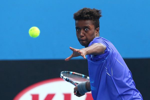 Mikael Ymer during a tennis competition wearing blue sportswear