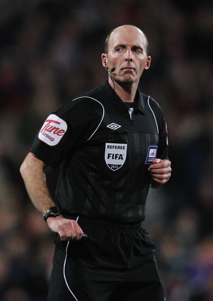Mike Dean (referee) REFEREE REVIEW 2012 Mike Dean looking for explanations