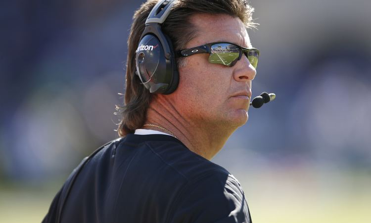 Mike Gundy Mike Gundy accidentally got smacked by his own player after an