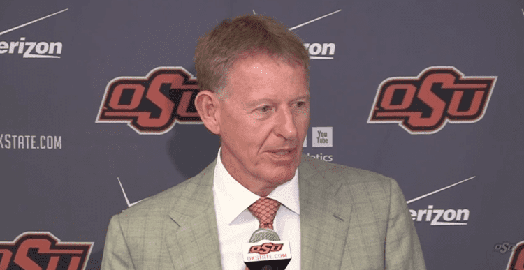 Mike Holder Mike Holder says Travis Ford will remain coach at OSU Pistols Firing