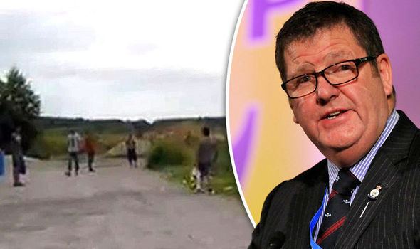 Mike Hookem Calais crisis WATCH Migrant THREATENS MEP WITH GUN