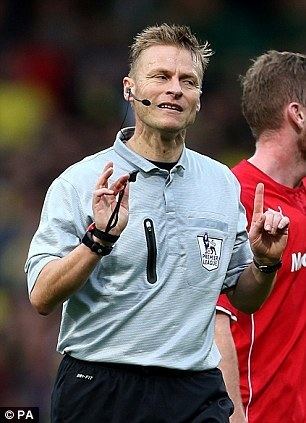 Mike Jones (referee) Referee Mike Jones is demoted after wrongly ruling out