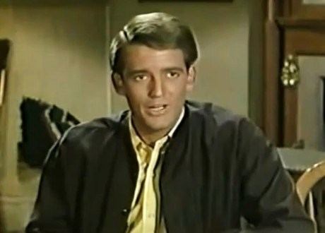 Mike Minor (actor) as Steve Elliott wearing a shirt and a black jacket on TV's Petticoat Junction, 1969