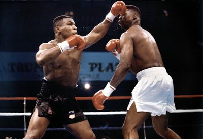 Mike Tyson vs. Tyrell Biggs Flashback Friday Iron Mike Tyson vs Tyrell Biggs Round By