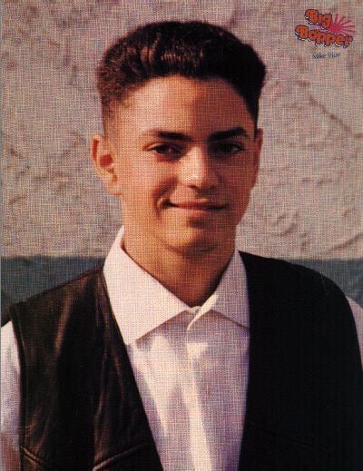 Michael Anthony Vitar wearing a black vest and a white shirt.