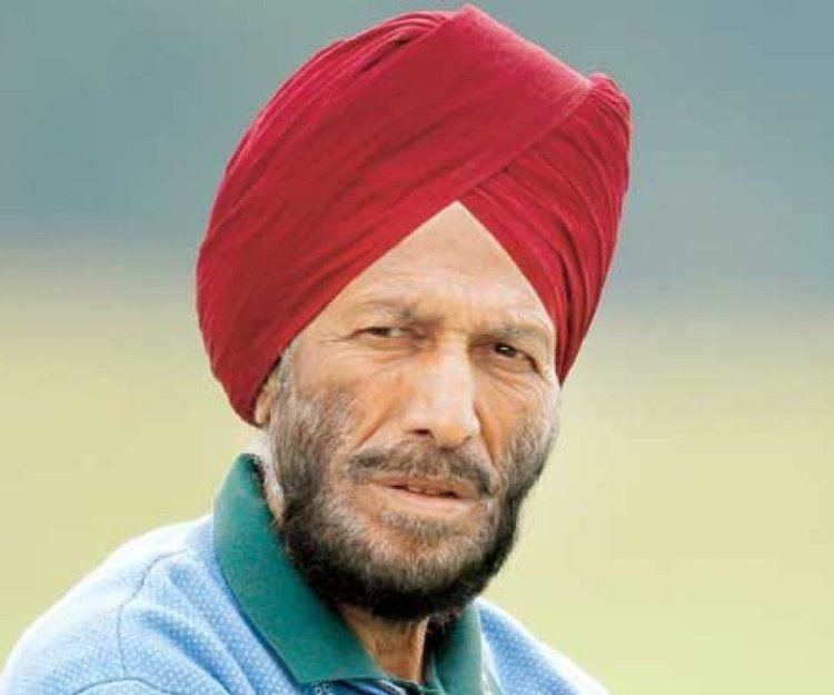 Milkha Singh wearing a red turban