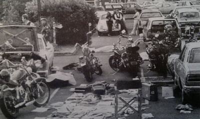 Two motorbikes parked alongside cars during the Milperra Massacre.