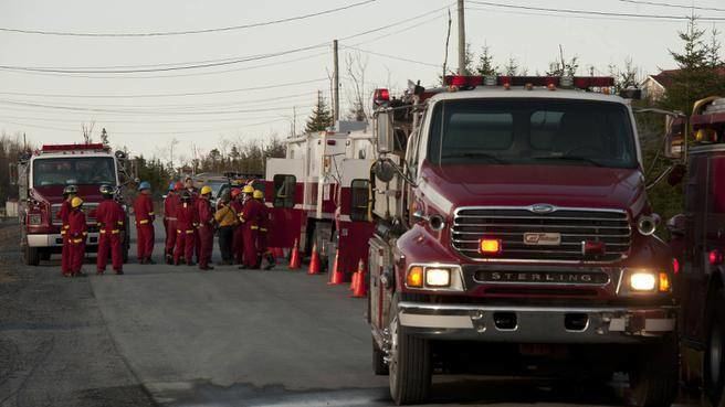 Mindville movie scenes Firefighters attend the scene of a brush fire near Shoreline Drive in Mineville on Thursday 