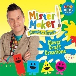 Poster of Mister Maker Comes to Town featuring Phil Gallagher smiling, and wearing a khaki coat over a polka dot printed shirt.