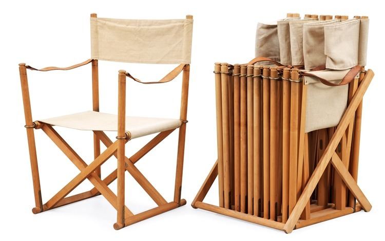 Mogens Koch A set of six folding chairs with stand by Mogens Koch