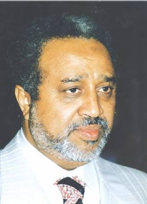 Mohammed Hussein Al Amoudi wearing white long sleeves and necktie