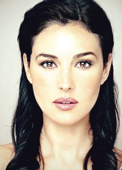 Monica Bellucci's headshot with black curly hair