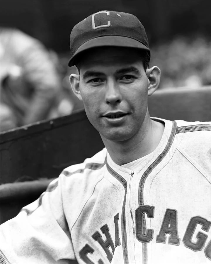 Monty Stratton with a tight-lipped smile while wearing a cap and Chicago white sox jersey