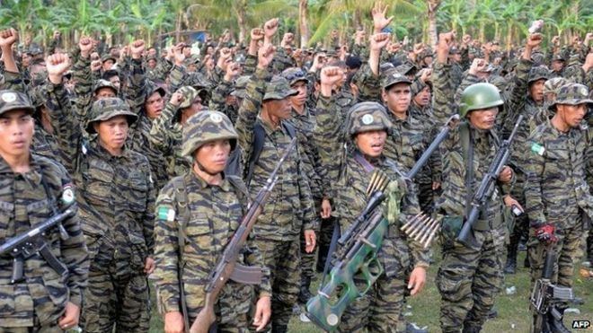 Moro Islamic Liberation Front Philippines signs landmark deal to end Muslim uprising BBC News
