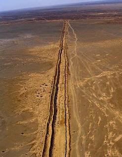 Moroccan Western Sahara Wall SAHARA BIKE RACE SAHARA BIKE RACE in English