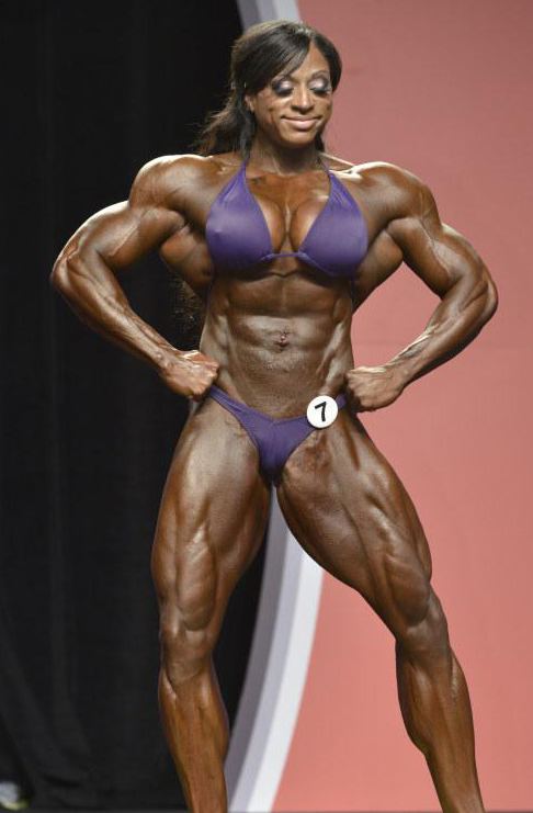 Ms. Olympia Iris Kyle makes bodybuilding history at 2013 Ms Olympia taking a