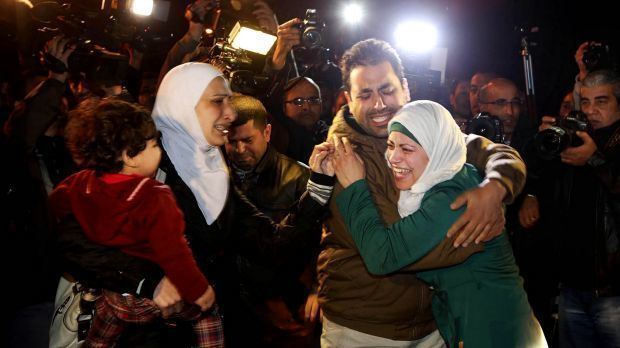 Muath Al-Kasasbeh's family crying during the protest in front of the Royal Palace in Amman