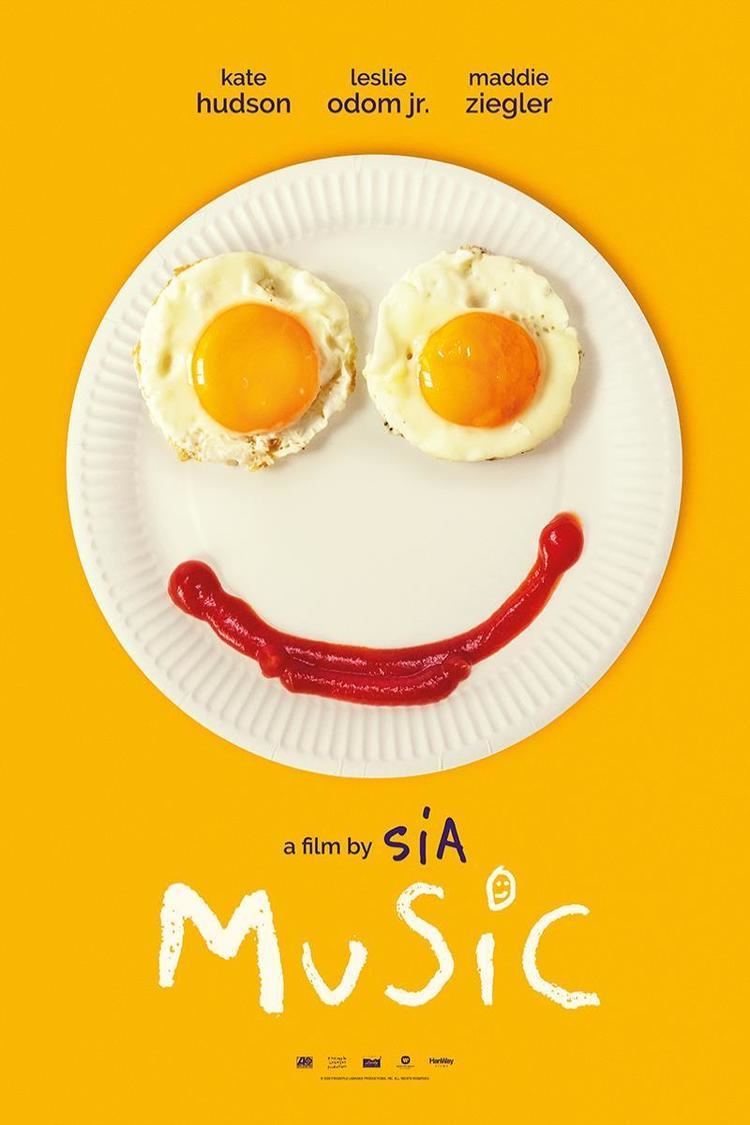 Two eggs on a plate with ketchup creates a smiley face in the movie poster of the 2021 American musical drama film, Music