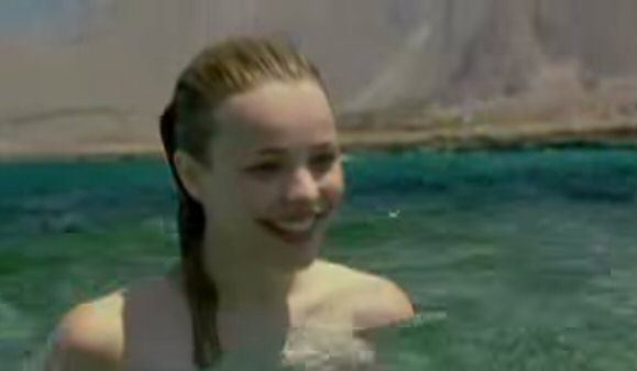 Rachel McAdams as Sally Garfield smiling while at the beach in a movie scene from the 2002 comedy film My Name Is Tanino