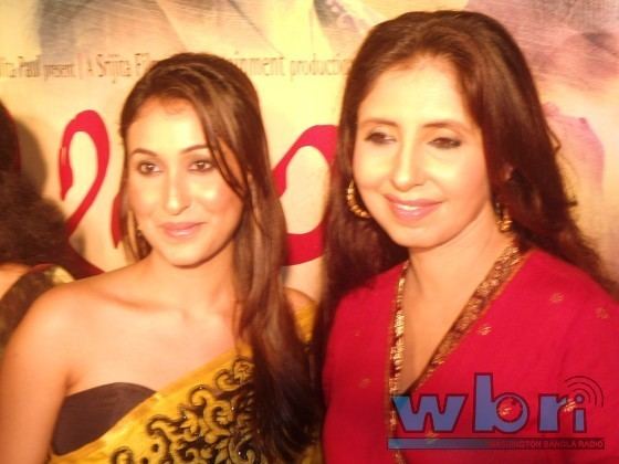 Na Hannyate movie scenes Indian Bengali Actresses Sayani Dutta left and Chaiti Ghosal at the music release of Na Hanyate