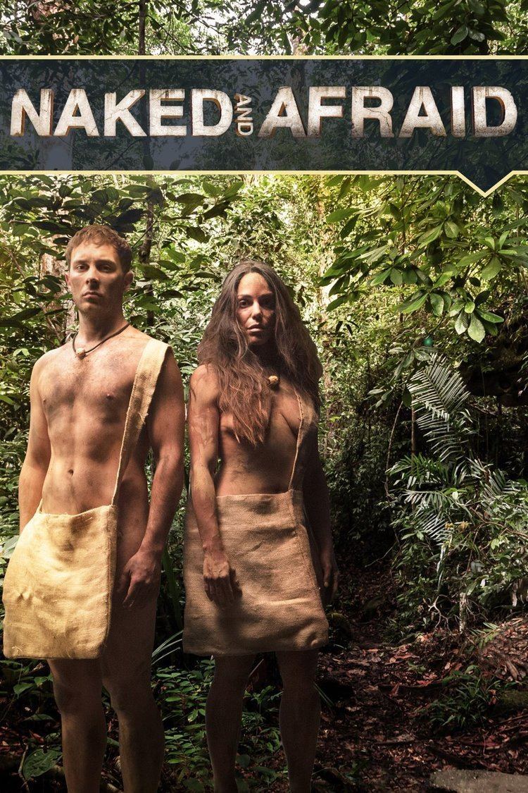 Two of the participants of the reality show "Naked and Afraid" standing in the forest naked with their private parts just covered with a sling bag