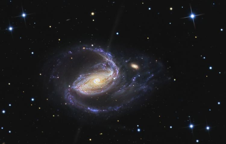 NGC 1097 APOD 2006 December 1 In the Arms of NGC 1097