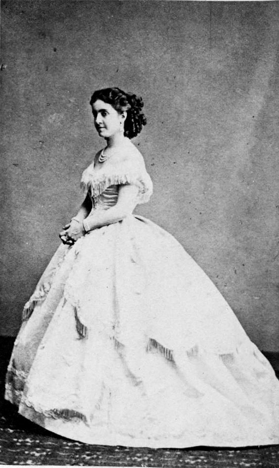 Ángela Peralta wearing a white long gown