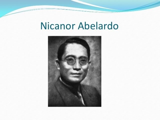 Nicanor Abelardo with tight lipped smile, short hairs, wearing round specks and black suit