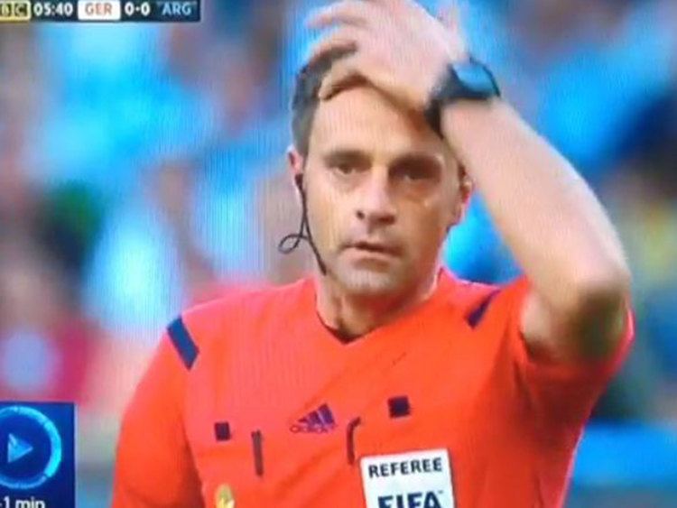 Nicola Rizzoli World Cup 2014 Final referee Nicola Rizzoli sorts out his hair