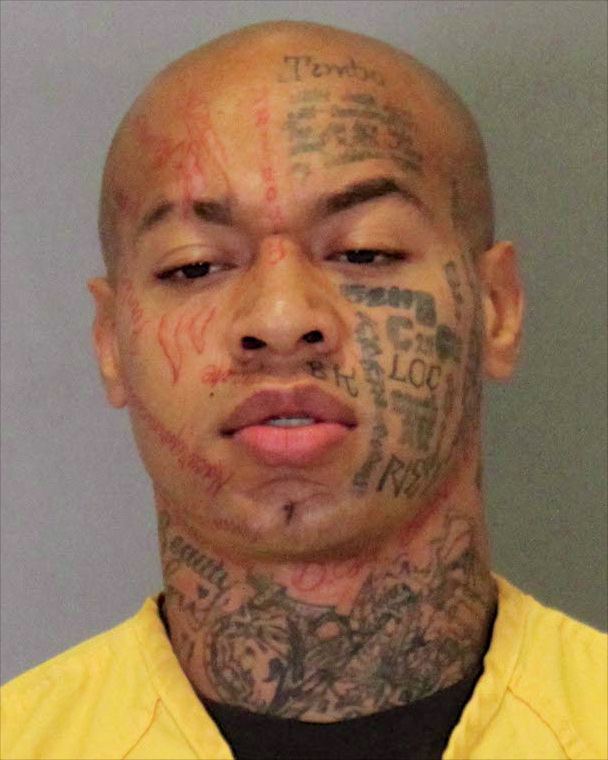 Nikko Jenkins wearing a yellow-shirt