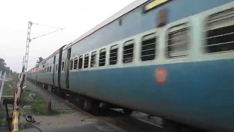 Nilgiri Express 12671 NILGIRI Express Level Crossing Shot between Coimbatore