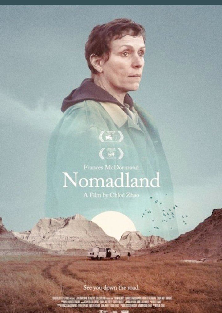 Frances McDormand and van on a mountainous road while she is wearing a blue jacket in the movie poster of the 2020 American drama film, Nomadland