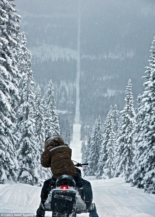 Norway–Sweden border Spectacular photos of snowmobilers riding snowy border between