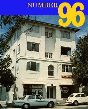 Poster of Number 96 (TV series) featuring a big house and two cars.